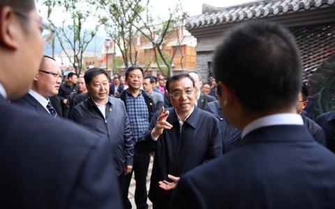 李克強(qiáng)為什么改變行程隨機(jī)考察一家農(nóng)村信用社